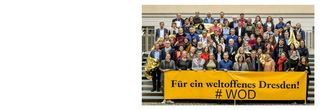 Mitglieder des Netzwerks mit einem Banner mit der Aufschrift Für ein weltoffenes Dresden.